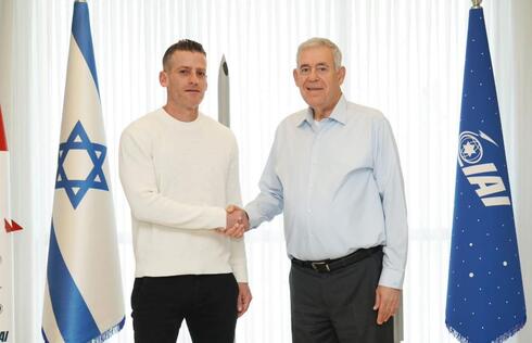 IAI CEO Boaz Levy and workers' union chairman Yair Katz. 