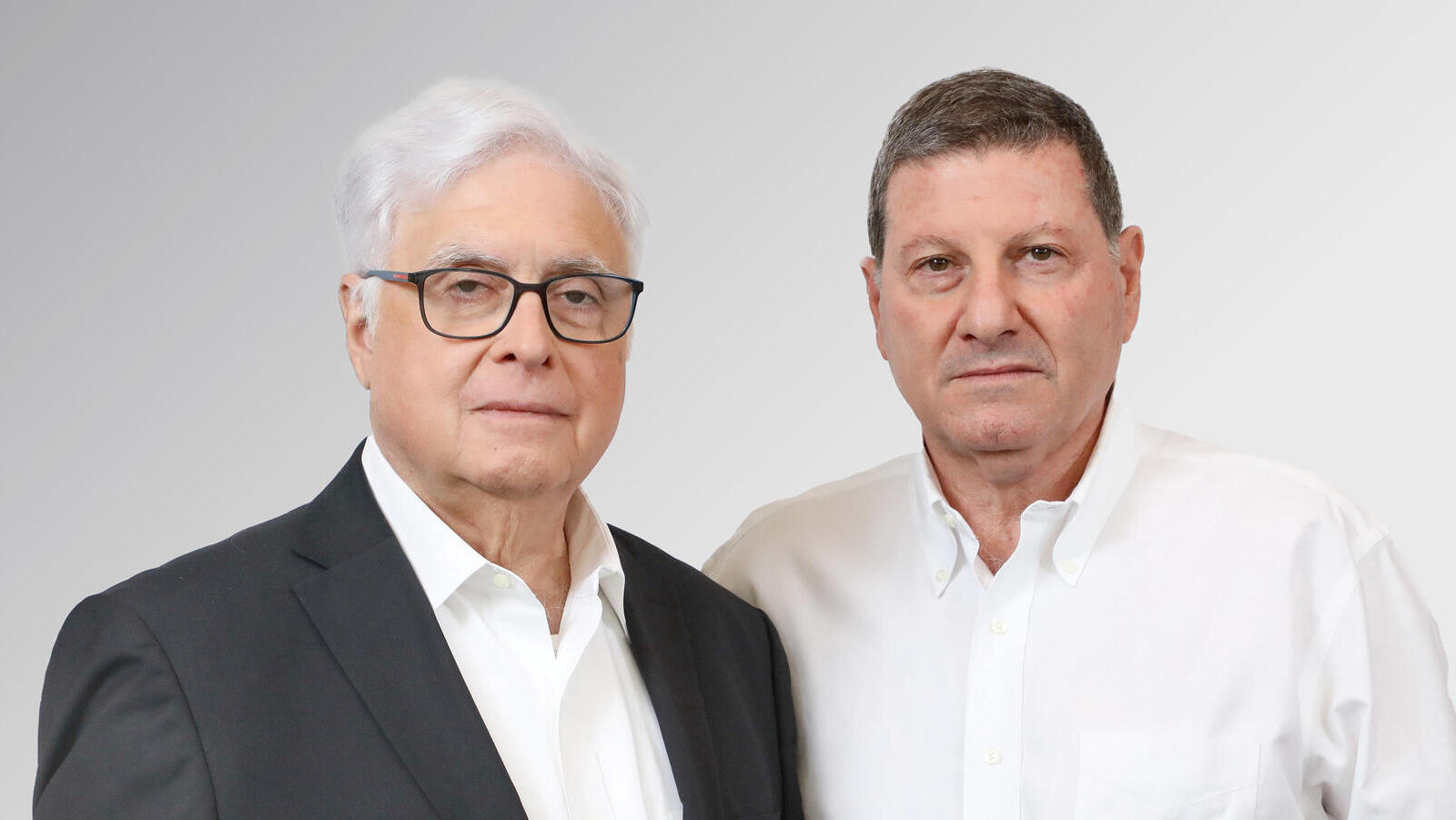 מימין גיל גירון מנכ"ל אשטרום ו רמי נוסבאום יו"ר החברה 