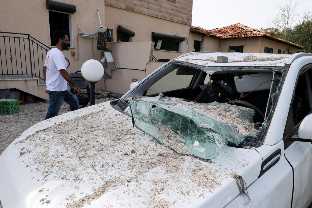 צילום: REUTERS/Ammar Awad הרס בעקבות ירי מ איראן במושב אשתאול 28.3.26