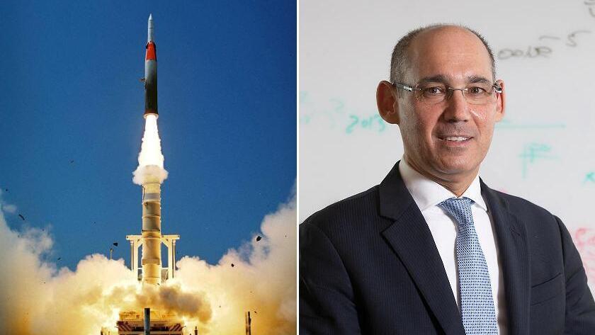 נגיד בנק ישראל אמיר ירון , לצד שיגור של טיל חץ