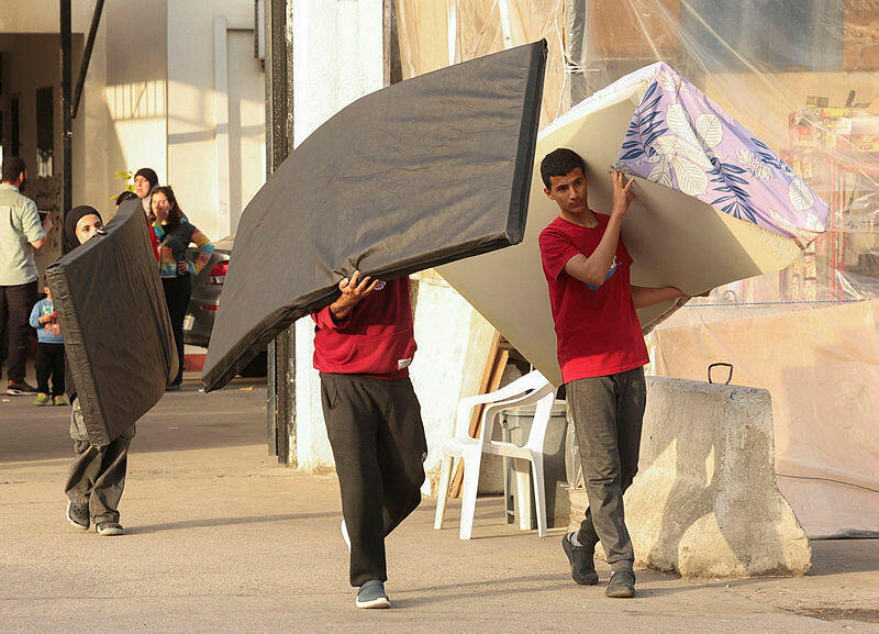 תושבים בצידון, הבוקר (צילום: REUTERS/Aziz Taher) צידון לבנון אחרי הפסקת האש 17.4.26