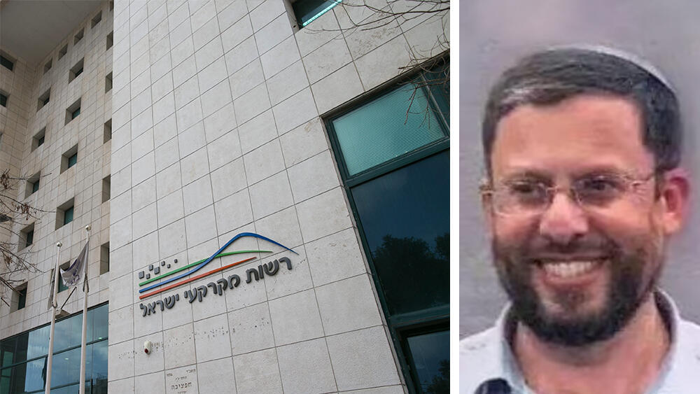 מנכ"ל מנהלת ההתיישבות יהודה אליהו לצד בניין רשות מקרקעי ישראל רמ"י