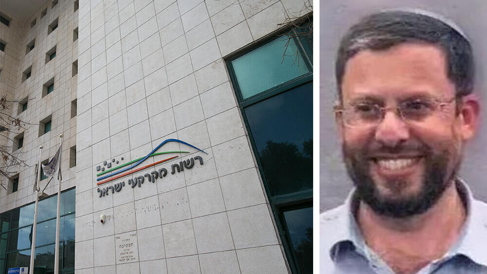 מנכ"ל מנהלת ההתיישבות יהודה אליהו לצד בניין רשות מקרקעי ישראל רמ"י