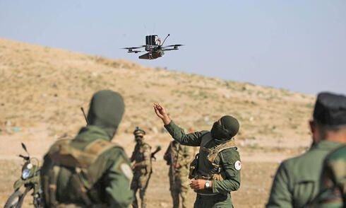 Ukrainian forces operating a fiber-optic drone. 