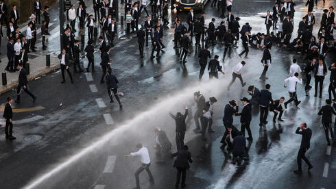 צילום: Ammar Awad/REUTERS הצבא הזהיר, אבל בקואליציה חגגו את יום ההשתמטות