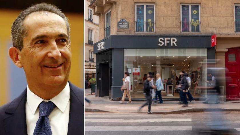 פטריק דרהי לצד חנות של SFR