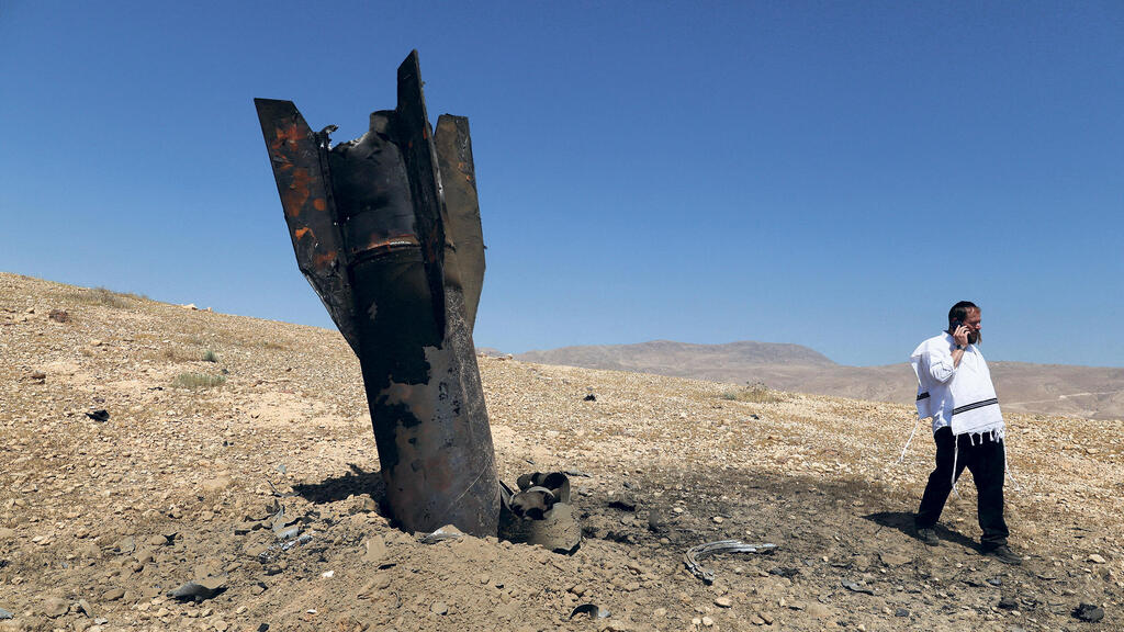 פגיעת טיל איראני בפאתי יריחו (צילום: Reuters/ Ammar Awad) פגיעת טיל איראני ב פאתי יריחו