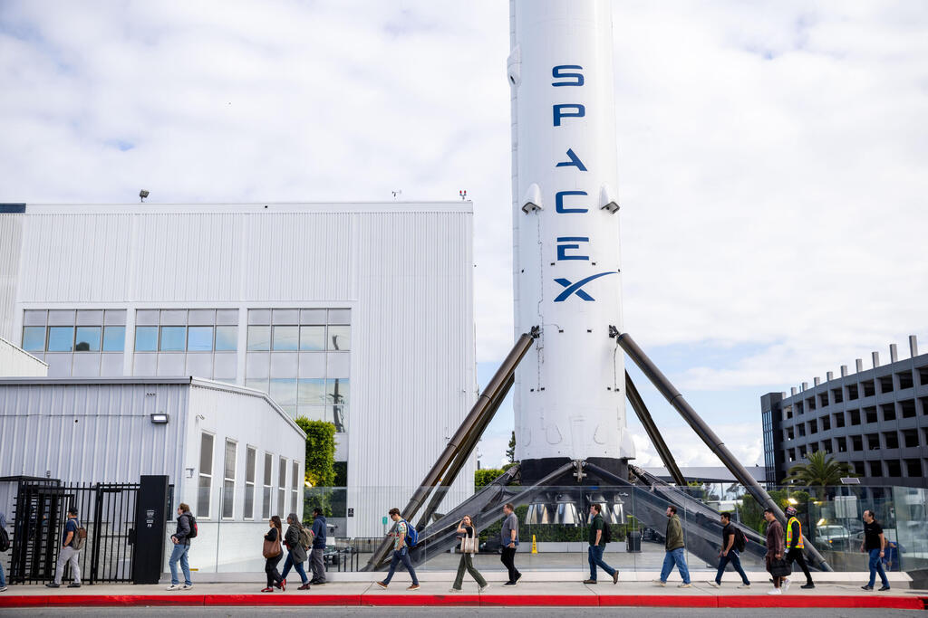 משגר פאלקון 9 של SpaceX (צילום: Ethan Swope/Bloomberg) משגר פאלקון 9 של SpaceX