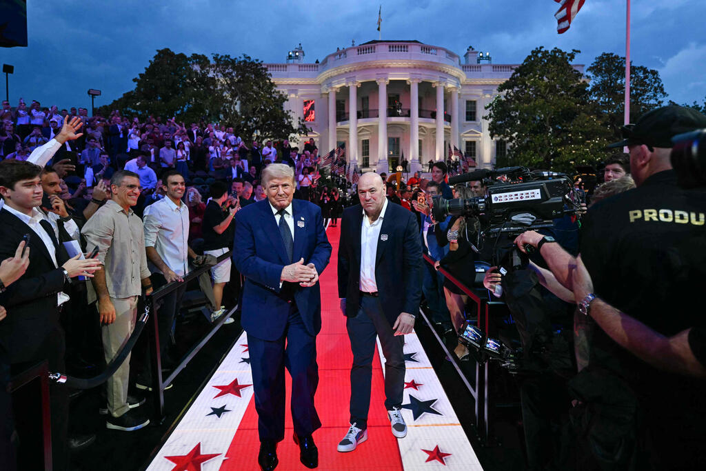 Kent Nishimura/AFP US President Donald Trump and UFC CEO Dana White arrive for the "UFC Freedom 250" mixed martial arts event on the South Lawn of the White House in Washington, DC, June 14, 2026. (Photo by Kent NISHIMURA / AFP)