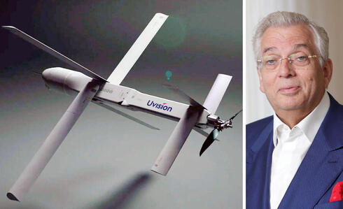 Aaron Frenkel alongside a UVision drone. Aaron Frenkel alongside a UVision drone.