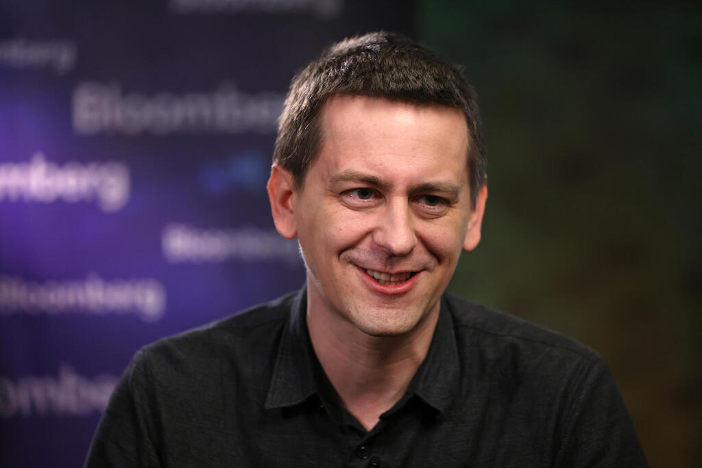 חתן פרס נובל לכימיה ד"ר ג'ון ג'אמפר (צילום: Hollie Adams/Bloomberg) ג'ון ג'אמפר גוגל דיפמיינד