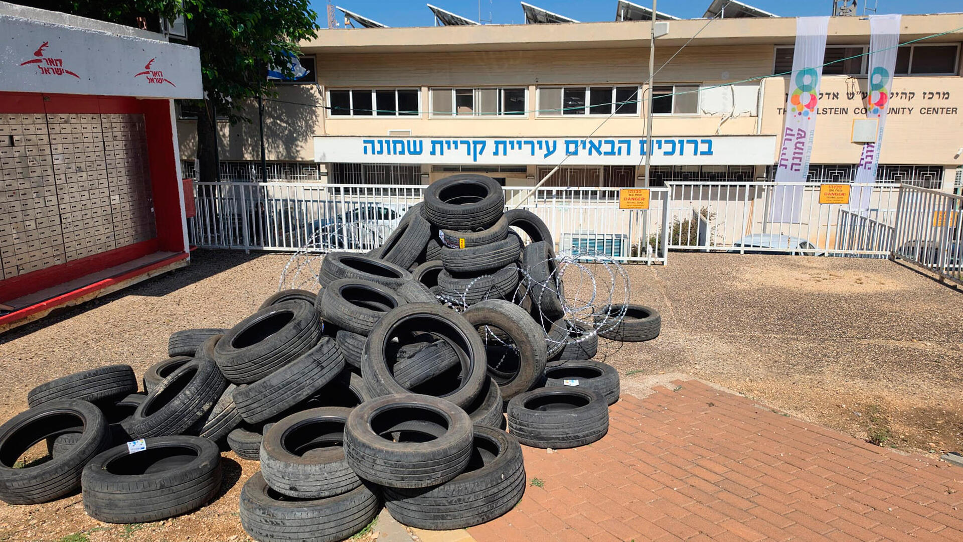 ערימת צמיגים משומשים