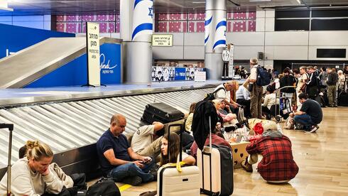 צילום: מאור שלום סויסה פתרון זמני למשבר בנתב"ג: עובדי הנהלה יעזרו לסבלים