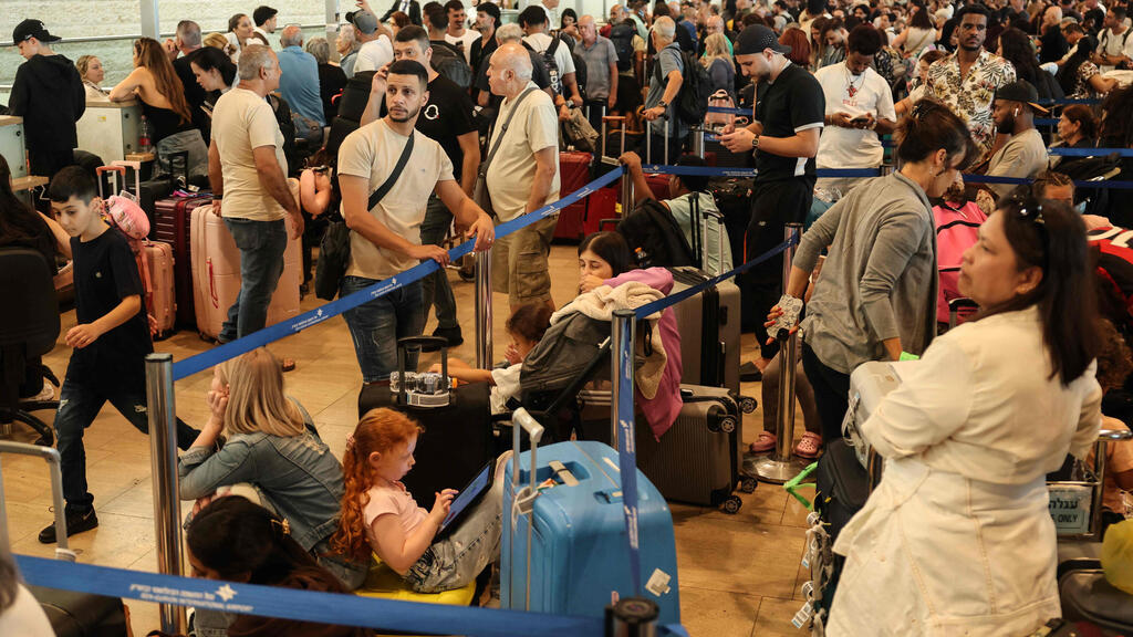 העומס בנתב"ג ביום חמישי האחרון (צילום: Jack GUEZ / AFP) העומס בנתב"ג ב-20.8