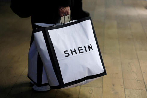 A SHEIN shopping bag. 