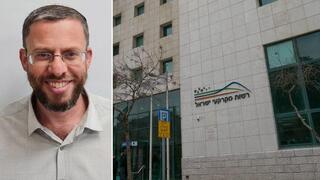 בניין רמ"י לצד מ"מ מנכ"ל רמ"י, יהודה אליהו