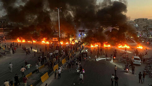 צילום: AP Photo/Ahmed Albam מחאת הדלק בסוריה: המשבר האזורי מגיע לכיס ויוצר מבחן פוליטי עבור משטר א-שרע