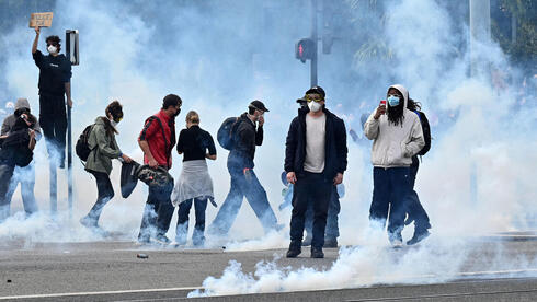 צילום: Matthieu Rondel/AFP רבבות שוטרים ברחובות צרפת: 110 אלף הפגינו בפריז, כוננות כאוס גם באיטליה