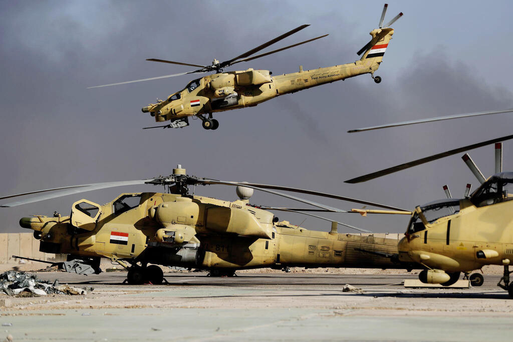 מסוקי MI28 בחיל האוויר העיראקי (צילום: Coex Thomas/AFP) הקברניט מסוק קרב MI28